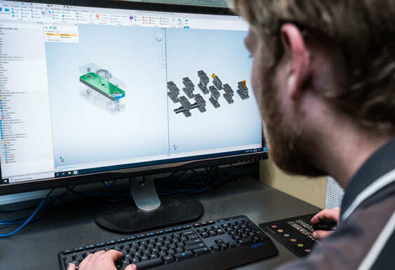 3D CAD model of a machine assembly on screen